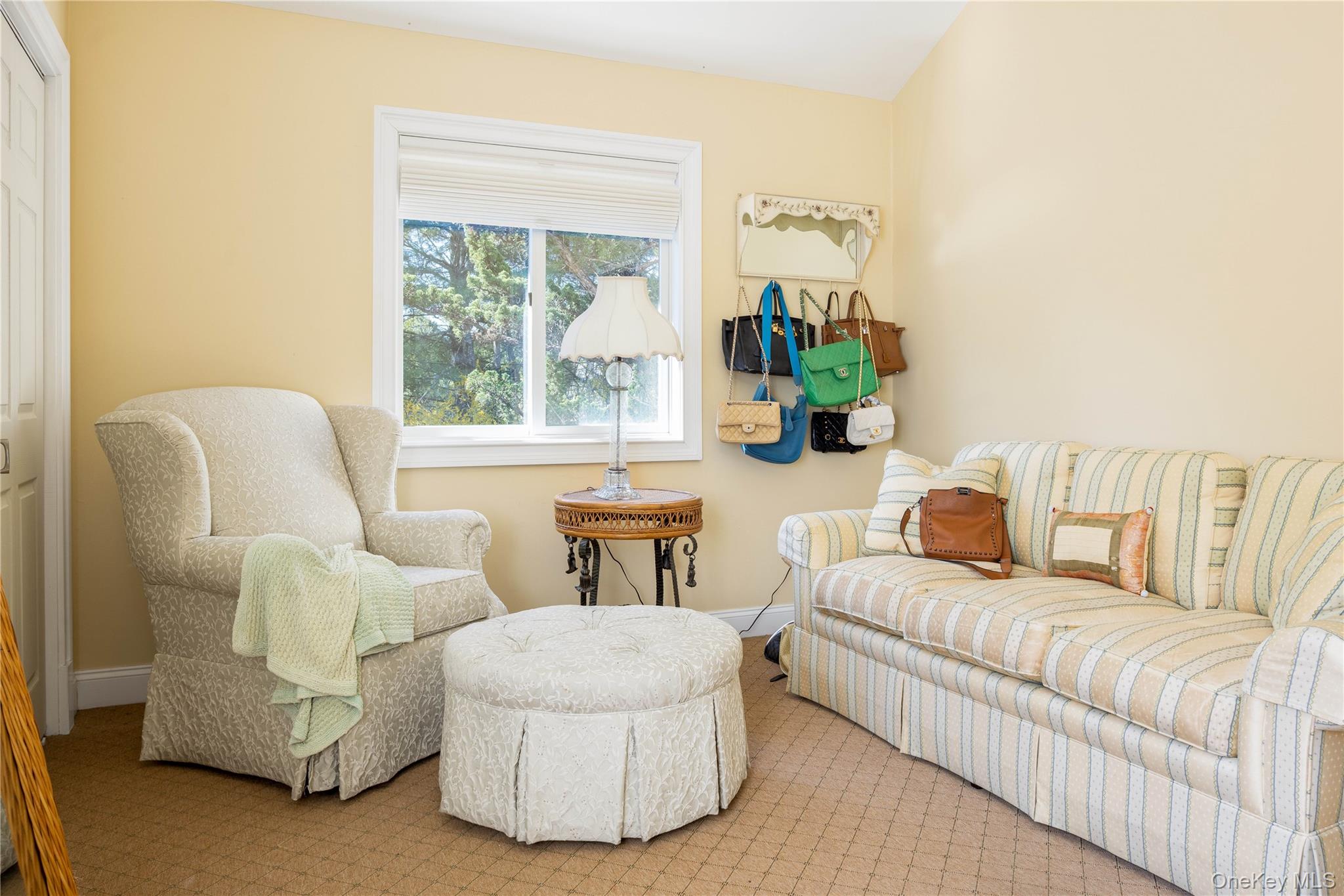 3 Clay Pit Road Remsenburg, NY 11960 - Photo 14 of 20 a living room with furniture and a large window