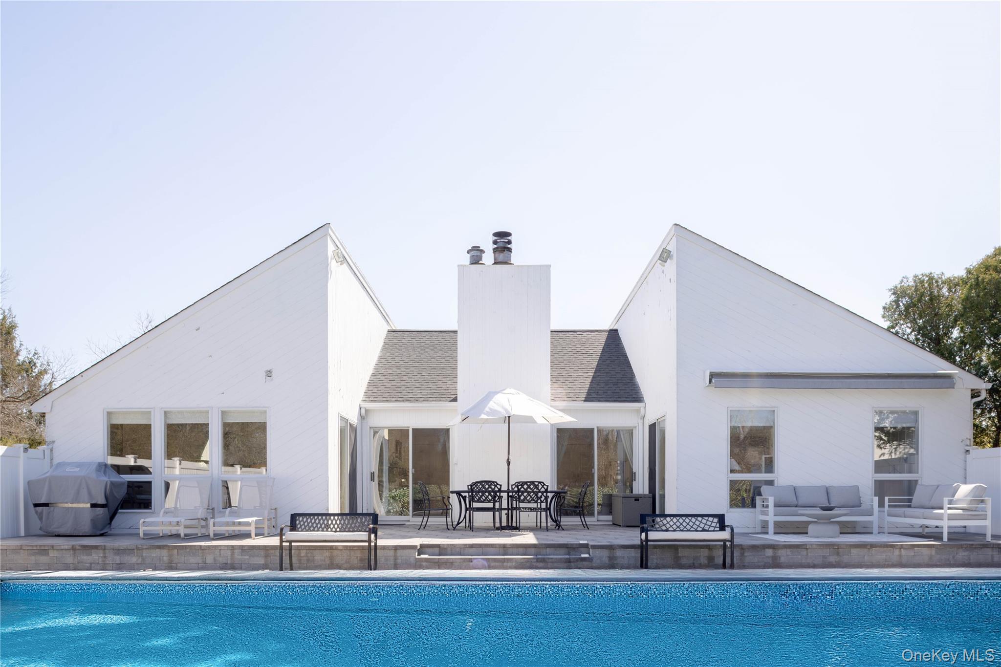 3 Clay Pit Road Remsenburg, NY 11960 - Photo 15 of 20 a dinning area with glass top table and chairs