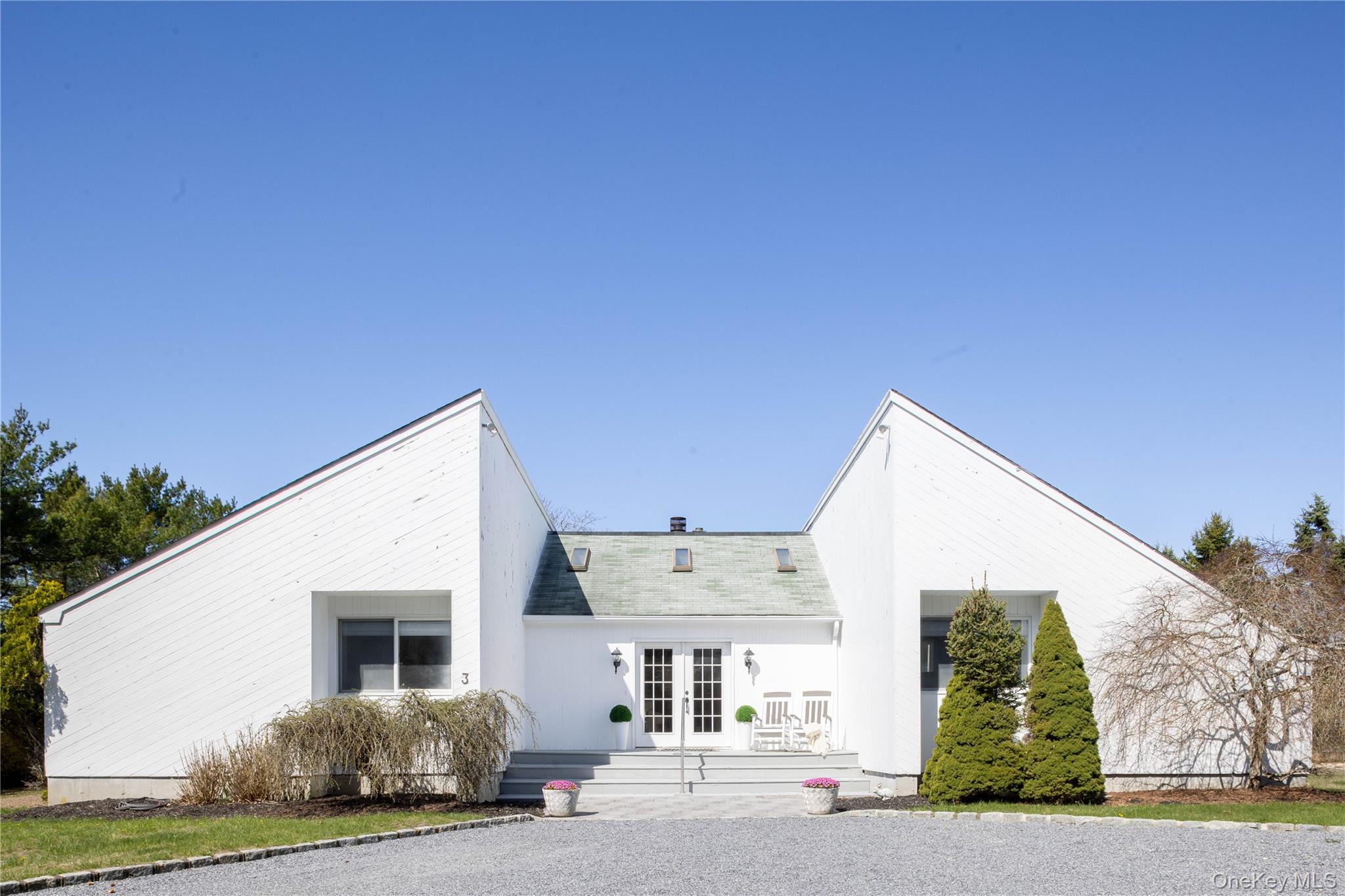 3 Clay Pit Road Remsenburg, NY 11960 - Photo 2 of 20 a view of a house with a yard