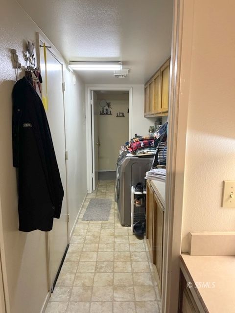 105 South Lilac Street Ridgecrest, CA 93555 - Photo 6 of 11 a view of a hallway and a livingroom with furniture