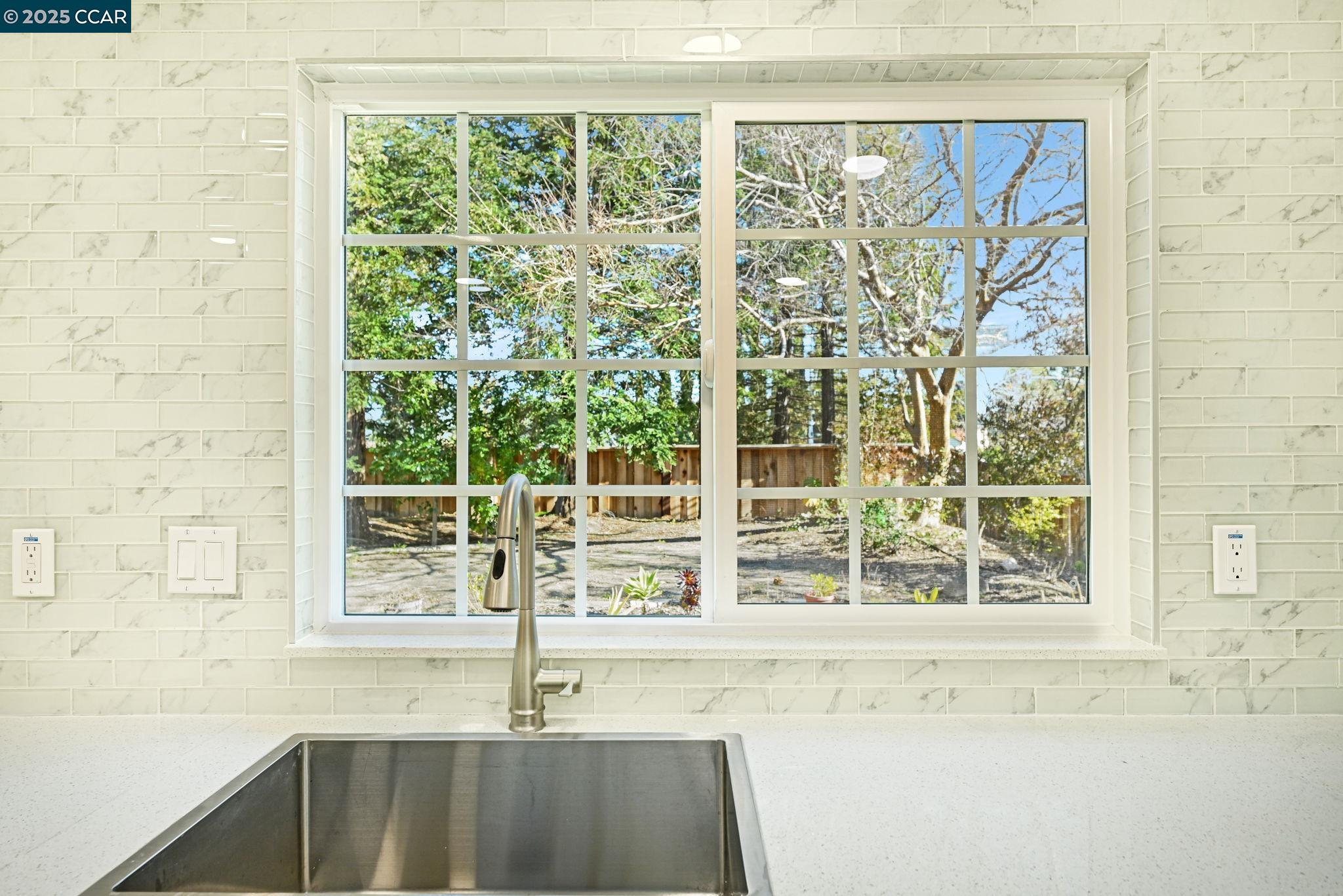 1181 Sunlight Circle Concord, CA 94518 - Photo 12 of 36 a bathroom with a sink and a large window