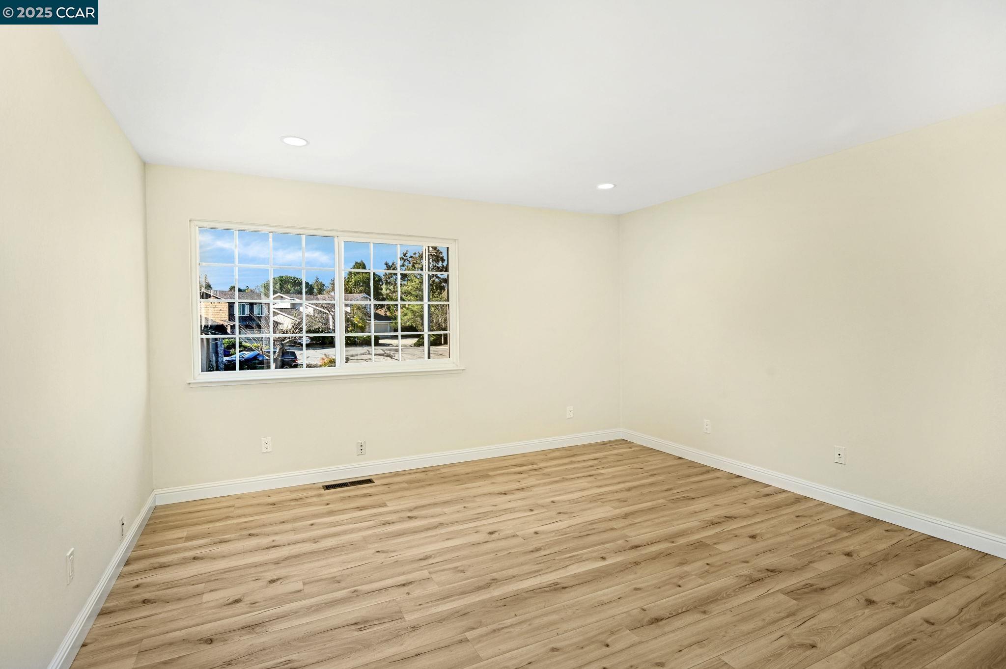 1181 Sunlight Circle Concord, CA 94518 - Photo 24 of 36 a view of a room with wooden floor and cabinet