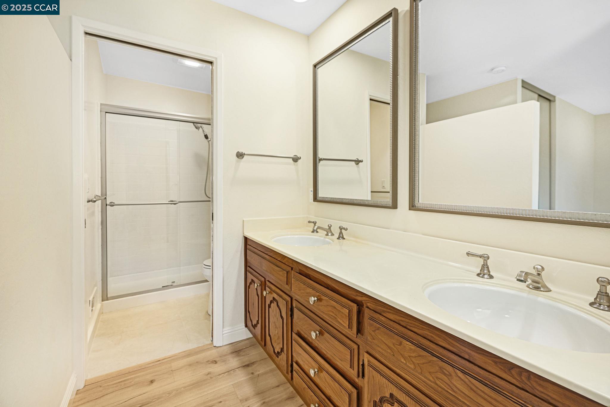 1181 Sunlight Circle Concord, CA 94518 - Photo 25 of 36 a bathroom with a sink and a mirror