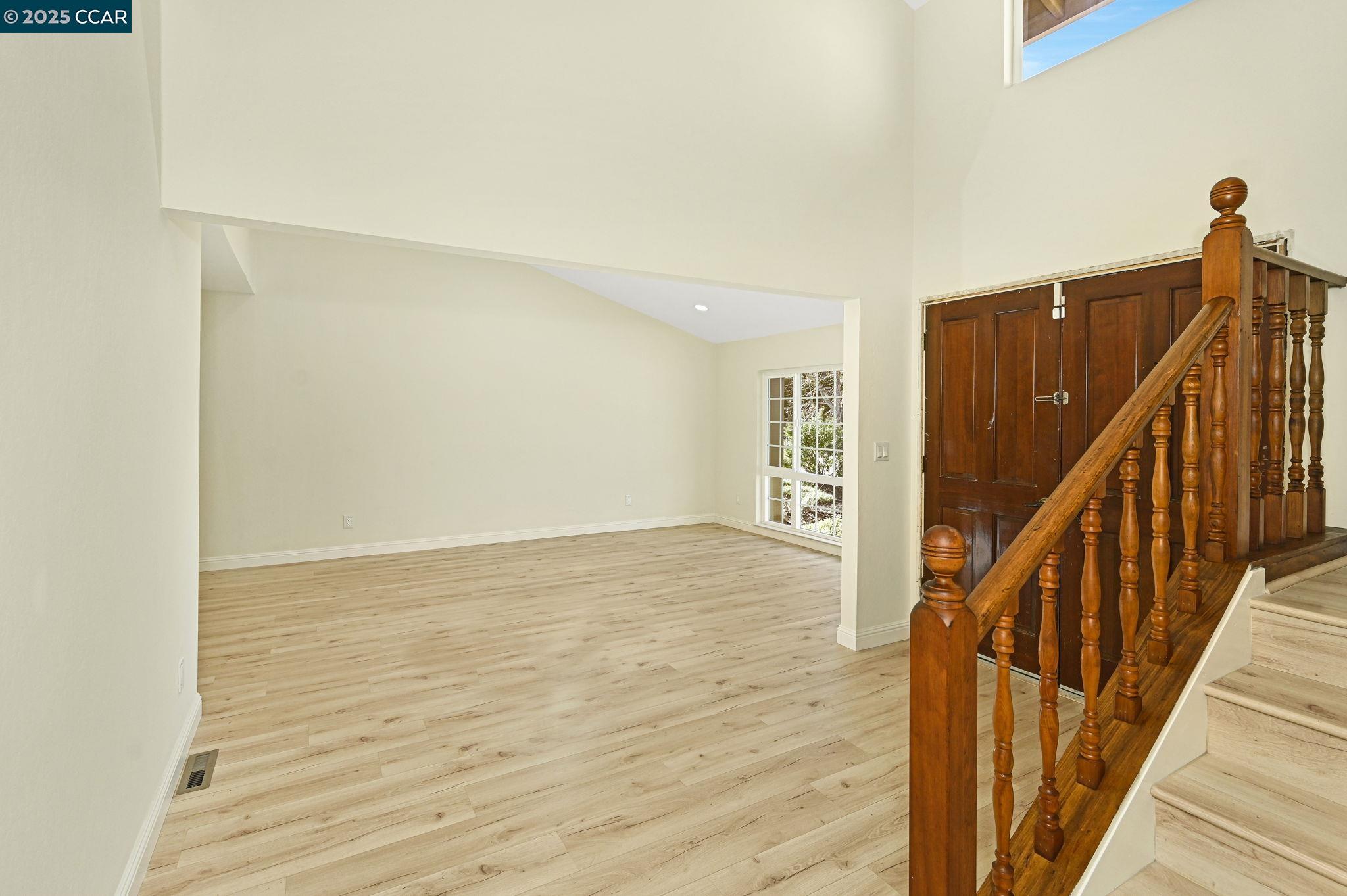 1181 Sunlight Circle Concord, CA 94518 - Photo 5 of 36 a view of an empty room with wooden floor