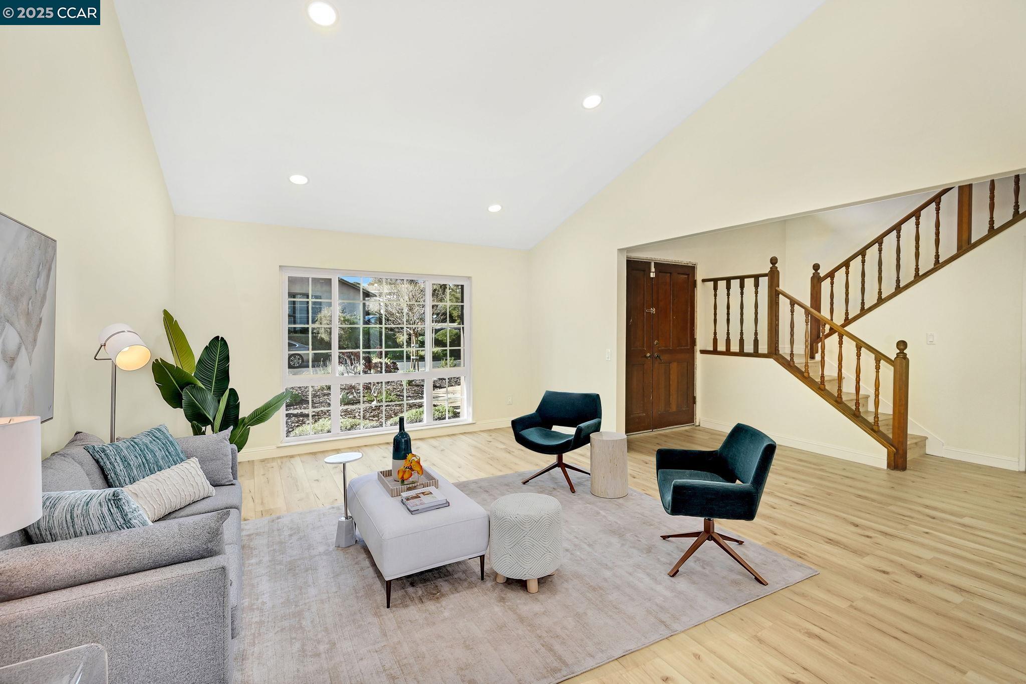 1181 Sunlight Circle Concord, CA 94518 - Photo 6 of 36 a living room with furniture and a wooden floor