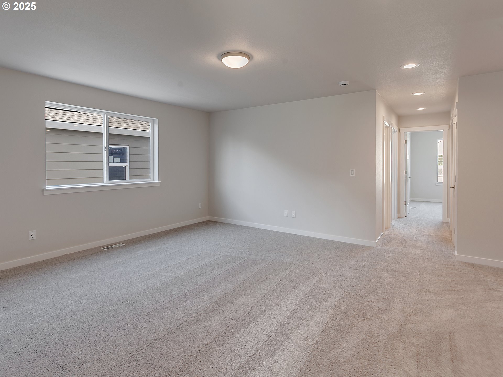 13858 Southwest 174th Avenue Tigard, OR 97140 - Photo 21 of 44 a view of an empty room with a window