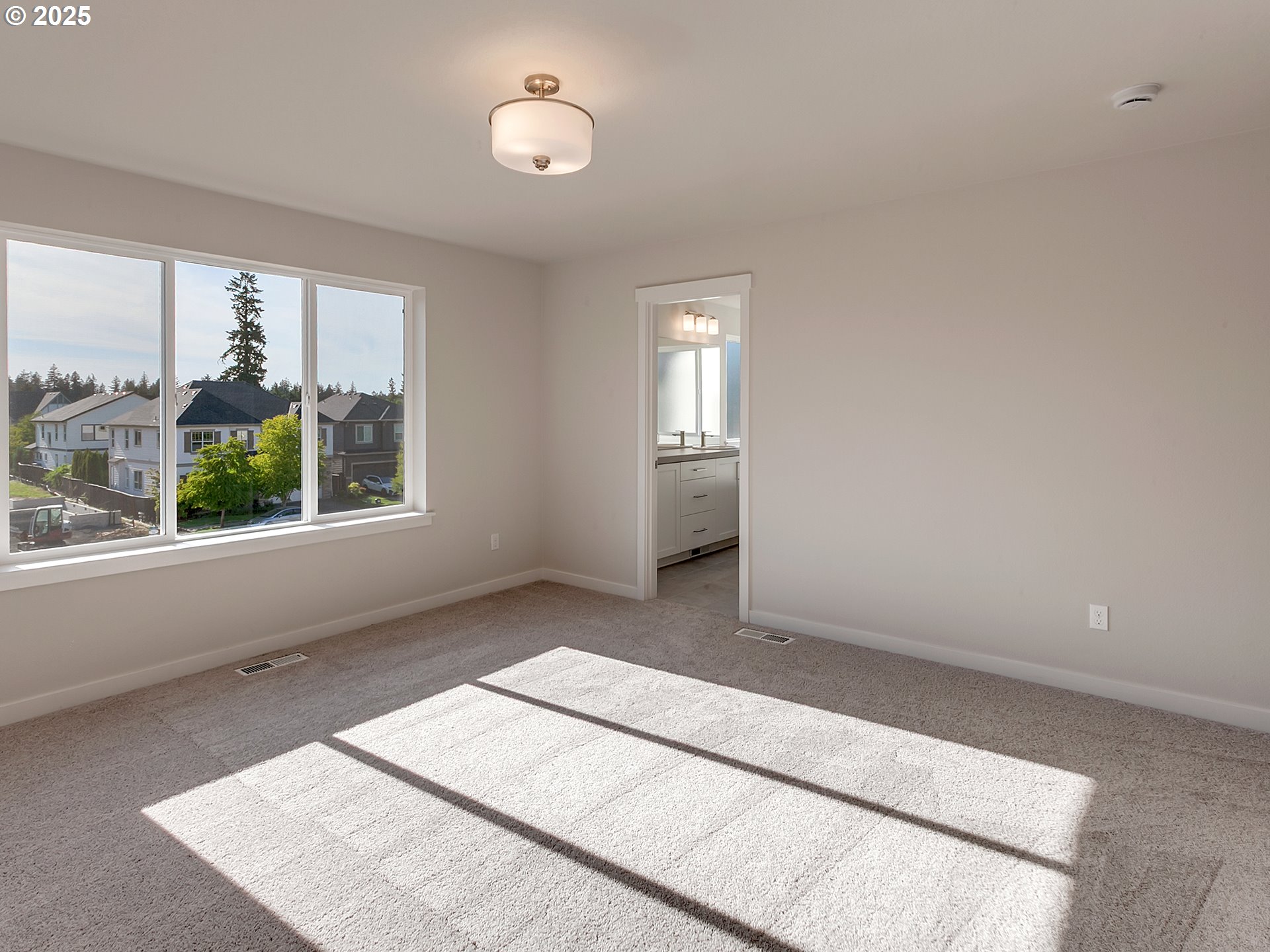13858 Southwest 174th Avenue Tigard, OR 97140 - Photo 23 of 44 an empty room with windows