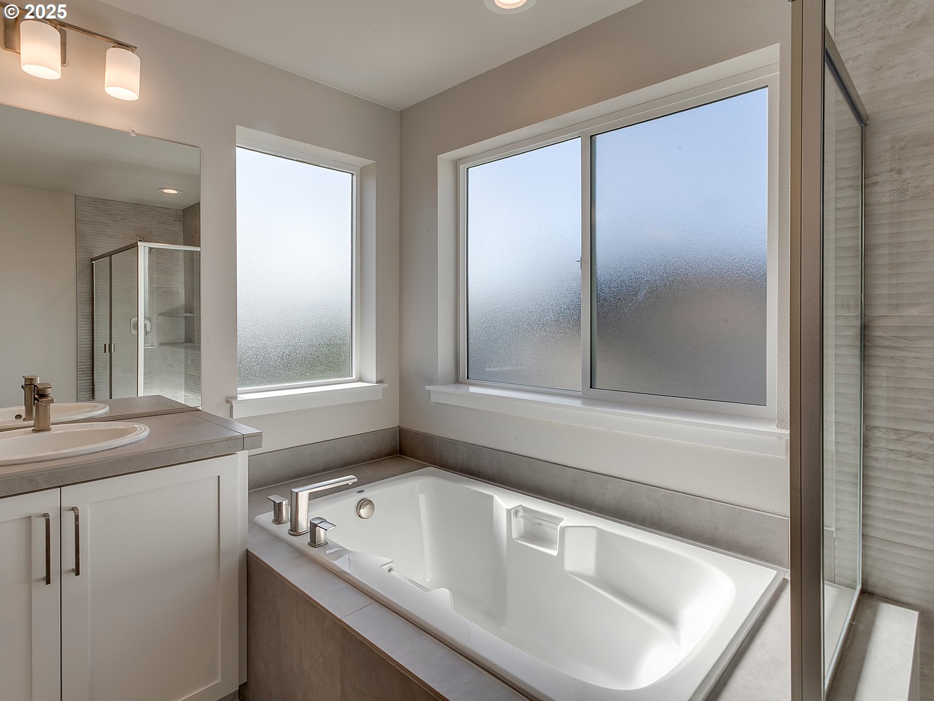 13858 Southwest 174th Avenue Tigard, OR 97140 - Photo 26 of 44 a bathroom with a sink and a mirror