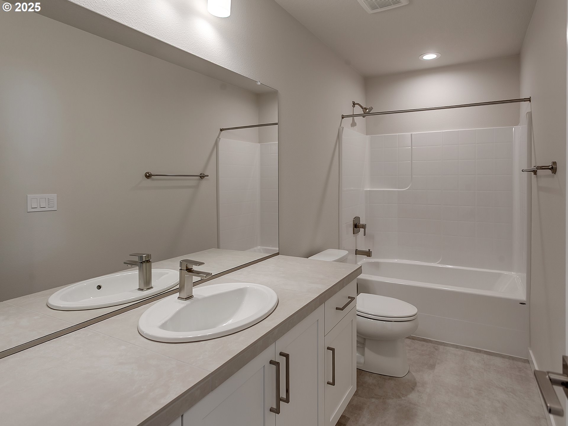 13858 Southwest 174th Avenue Tigard, OR 97140 - Photo 32 of 44 a bathroom with a double vanity sink toilet mirror and shower