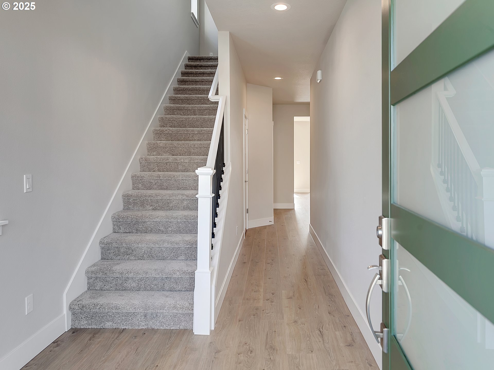 13858 Southwest 174th Avenue Tigard, OR 97140 - Photo 4 of 44 a view of entryway and hall with wooden floor