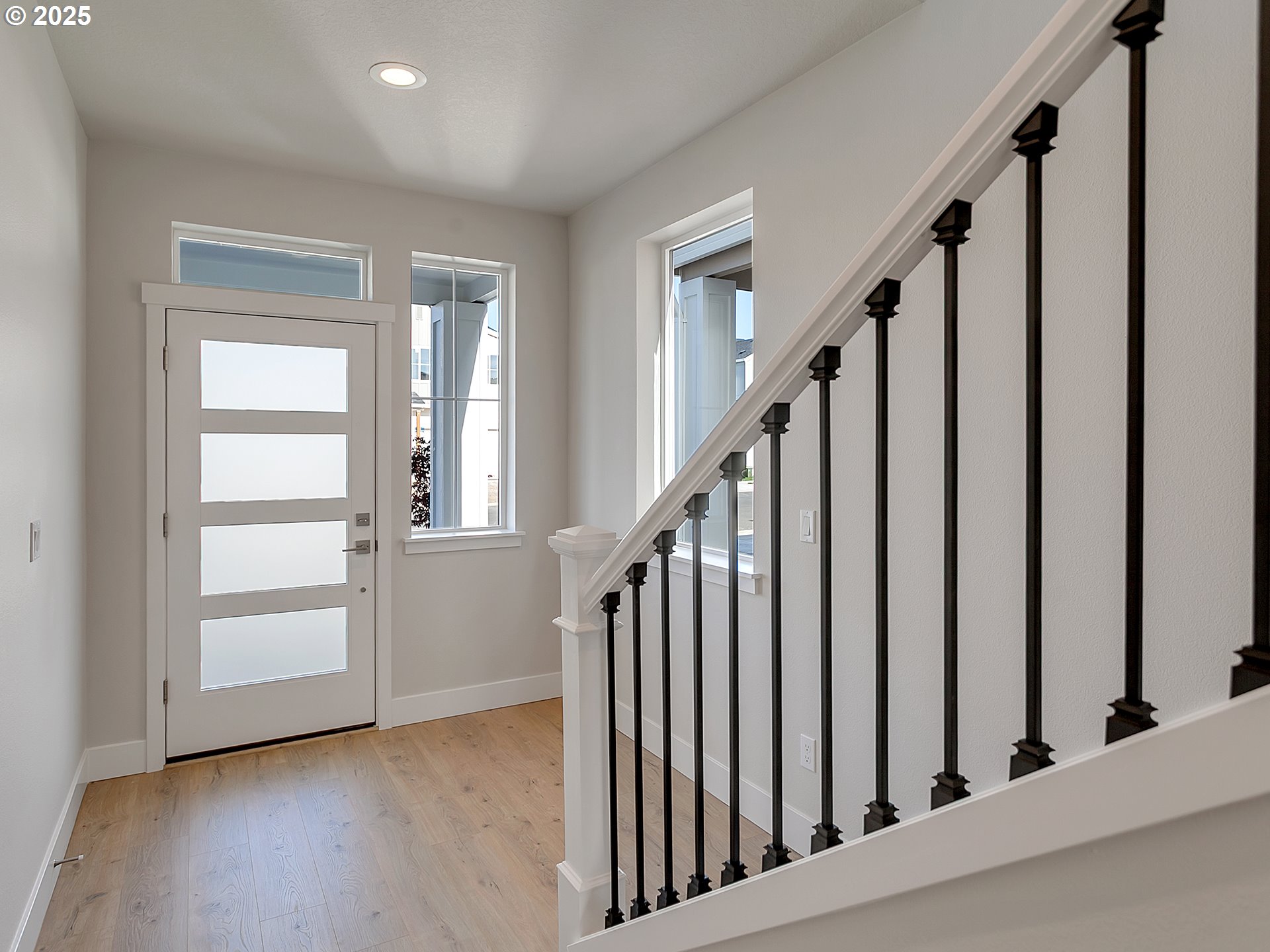 13858 Southwest 174th Avenue Tigard, OR 97140 - Photo 5 of 44 a view of staircase with wooden floor and staircase