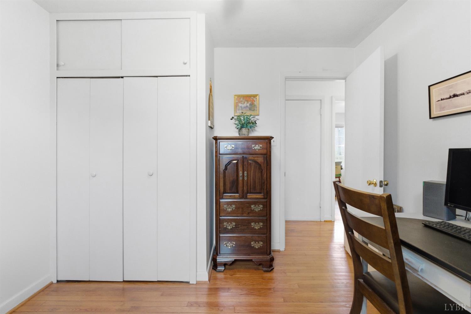 3189 Wildway Road Appomattox, VA 24522 - Photo 23 of 44 a view of a livingroom with furniture wooden floor kitchen and a window
