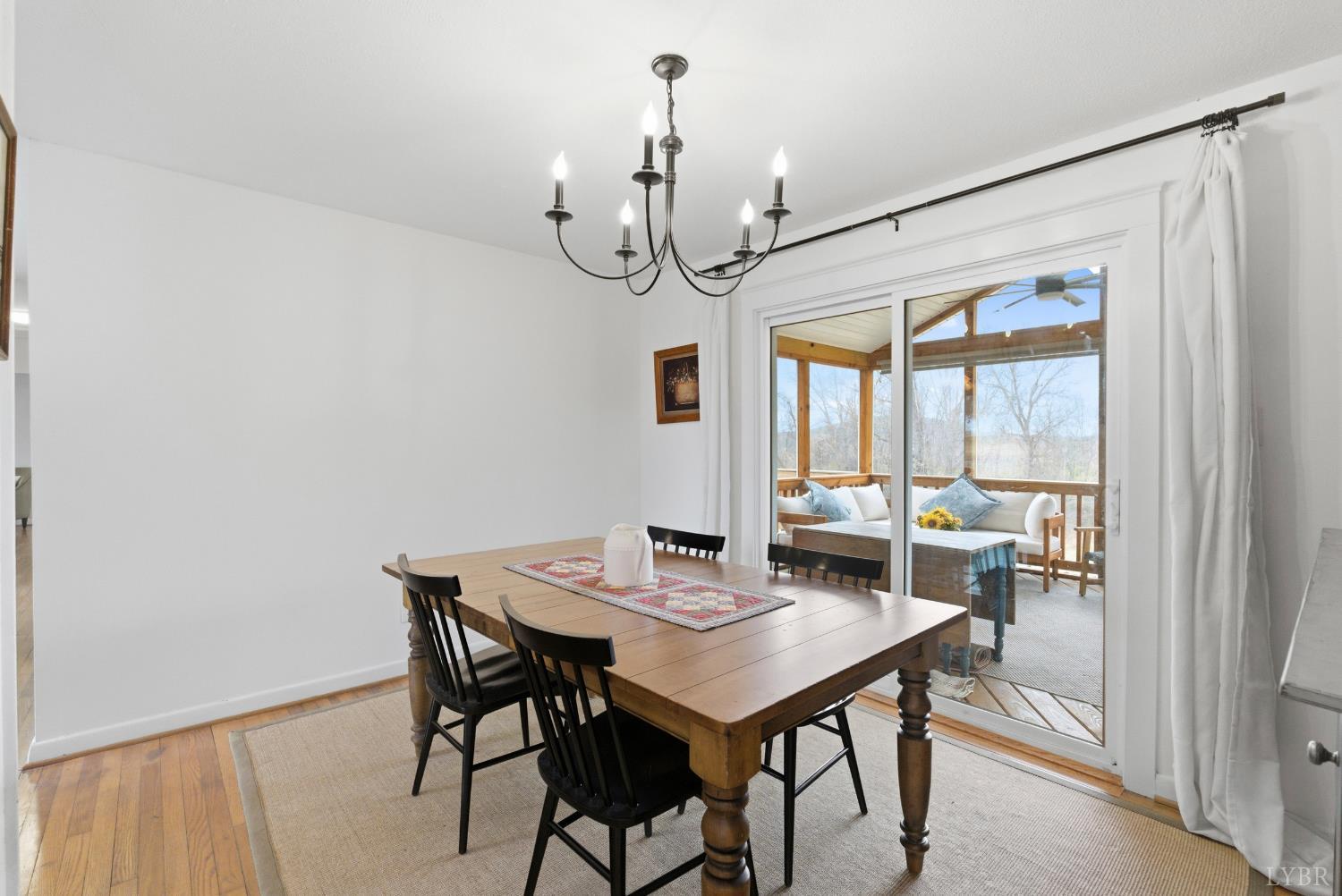 3189 Wildway Road Appomattox, VA 24522 - Photo 8 of 44 a view of a dining room with furniture window and outside view