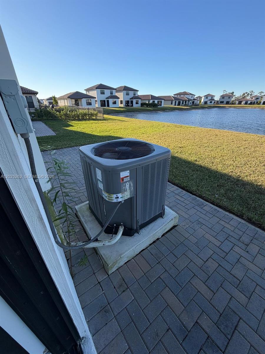 5669 Cerva Lane, Unit 5669 Immokalee, FL 34142 - Photo 8 of 32 a view of a swimming pool with a terrace