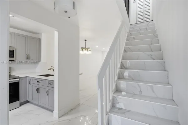 an aerial view of a house with outdoor space