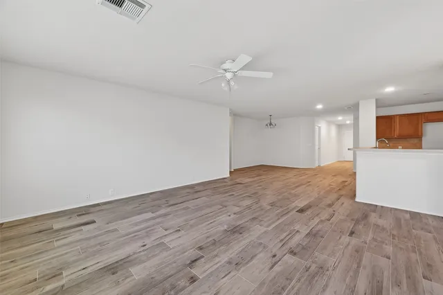 a view of kitchen with sink microwave and stove