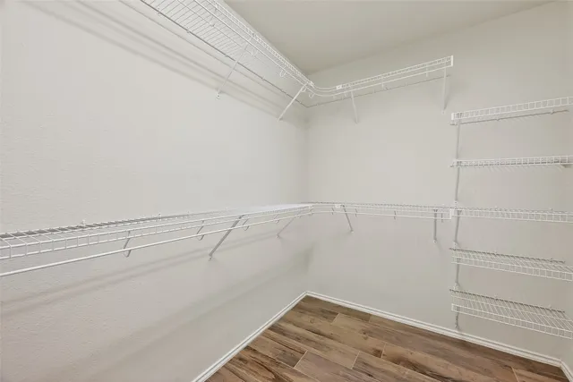 a view of a room with racks on the wall