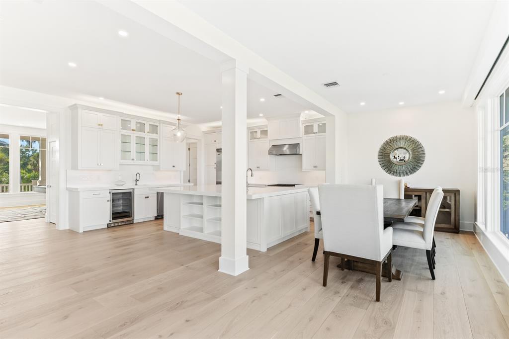 4070 Loomis Avenue Boca Grande, FL 33921 - Photo 19 of 59 a view of a kitchen with furniture and wooden floor