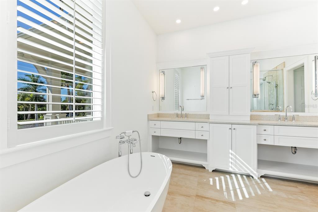 4070 Loomis Avenue Boca Grande, FL 33921 - Photo 30 of 59 a bathroom with a sink and a bathtub