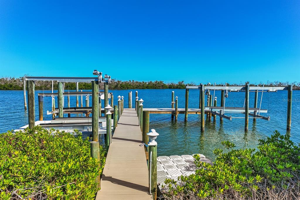 4070 Loomis Avenue Boca Grande, FL 33921 - Photo 59 of 59 a view of a water pond with lots of trees in the background