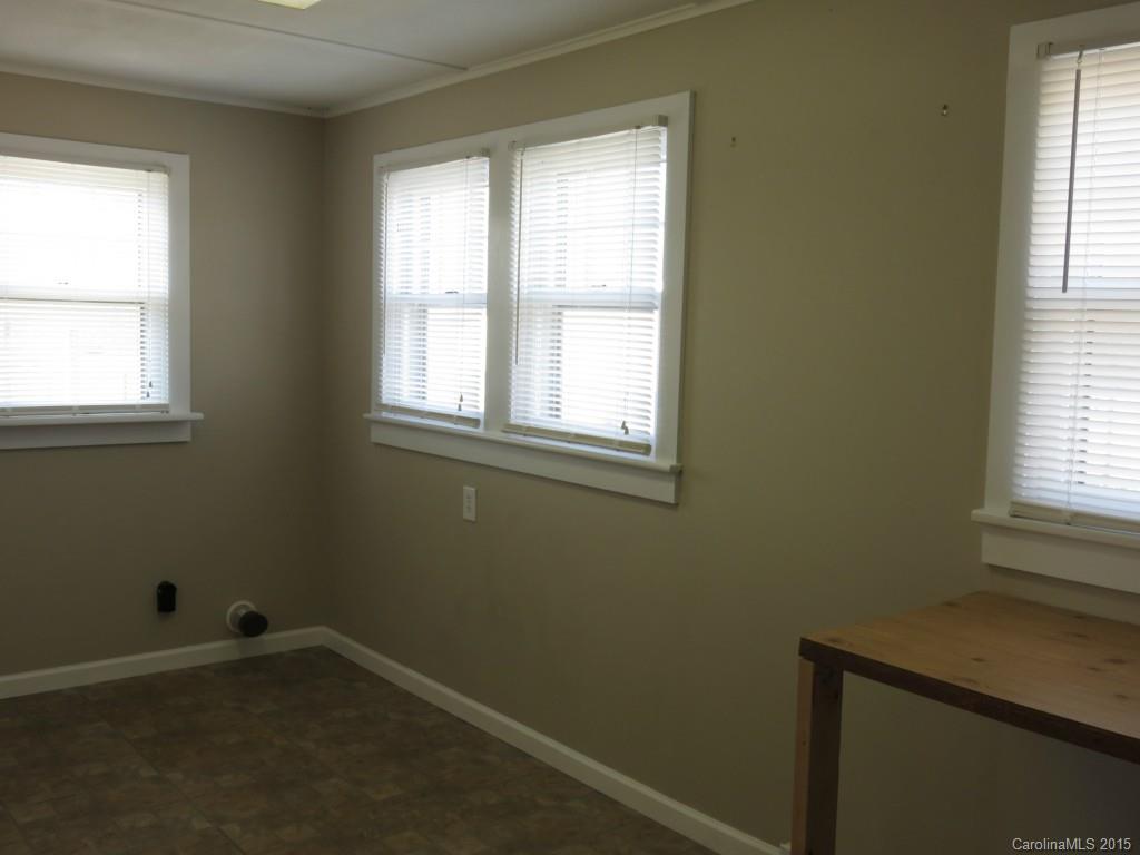 8635 Woodleaf Road Woodleaf, NC 27054 - Photo 14 of 24 a room that has a window in it