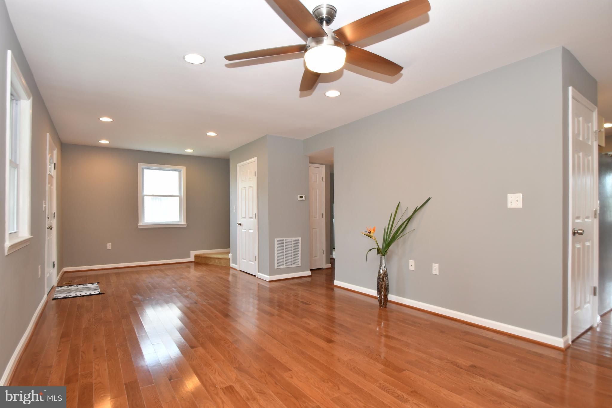8209 Northview Road Baltimore, MD 21222 - Photo 3 of 30 wooden floor in an empty room with a window