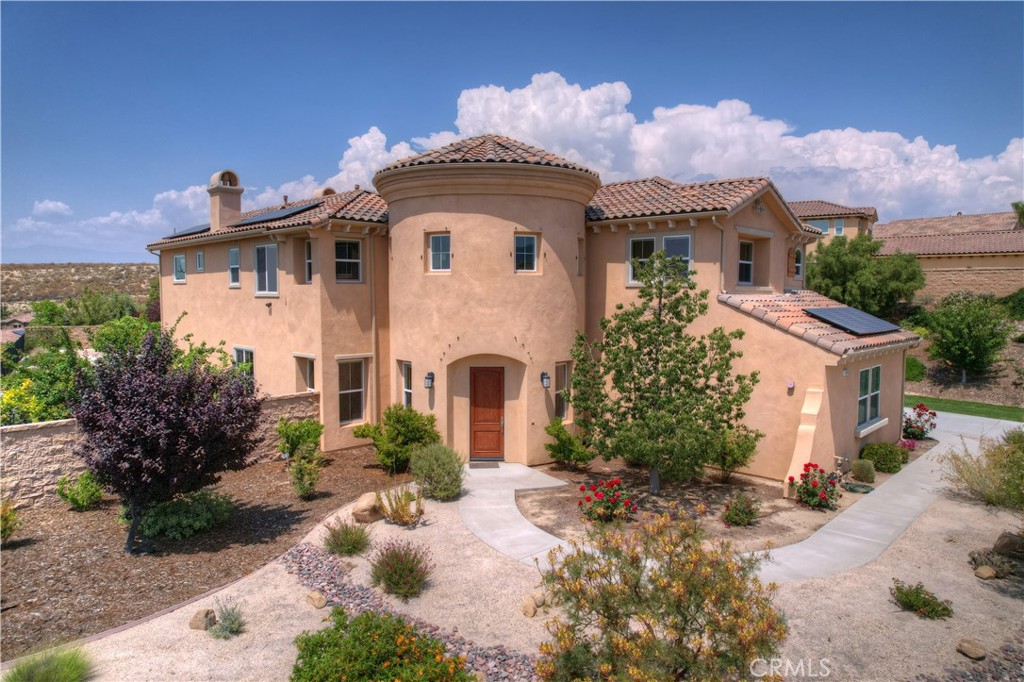3079 Crystal Ridge Lane Colton, CA 92324 - Photo 1 of 1 a front view of a house with garden