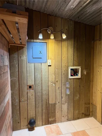 a bathroom with a toilet a sink and shower
