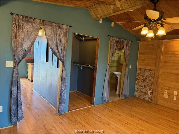 a bathroom with a toilet and shower