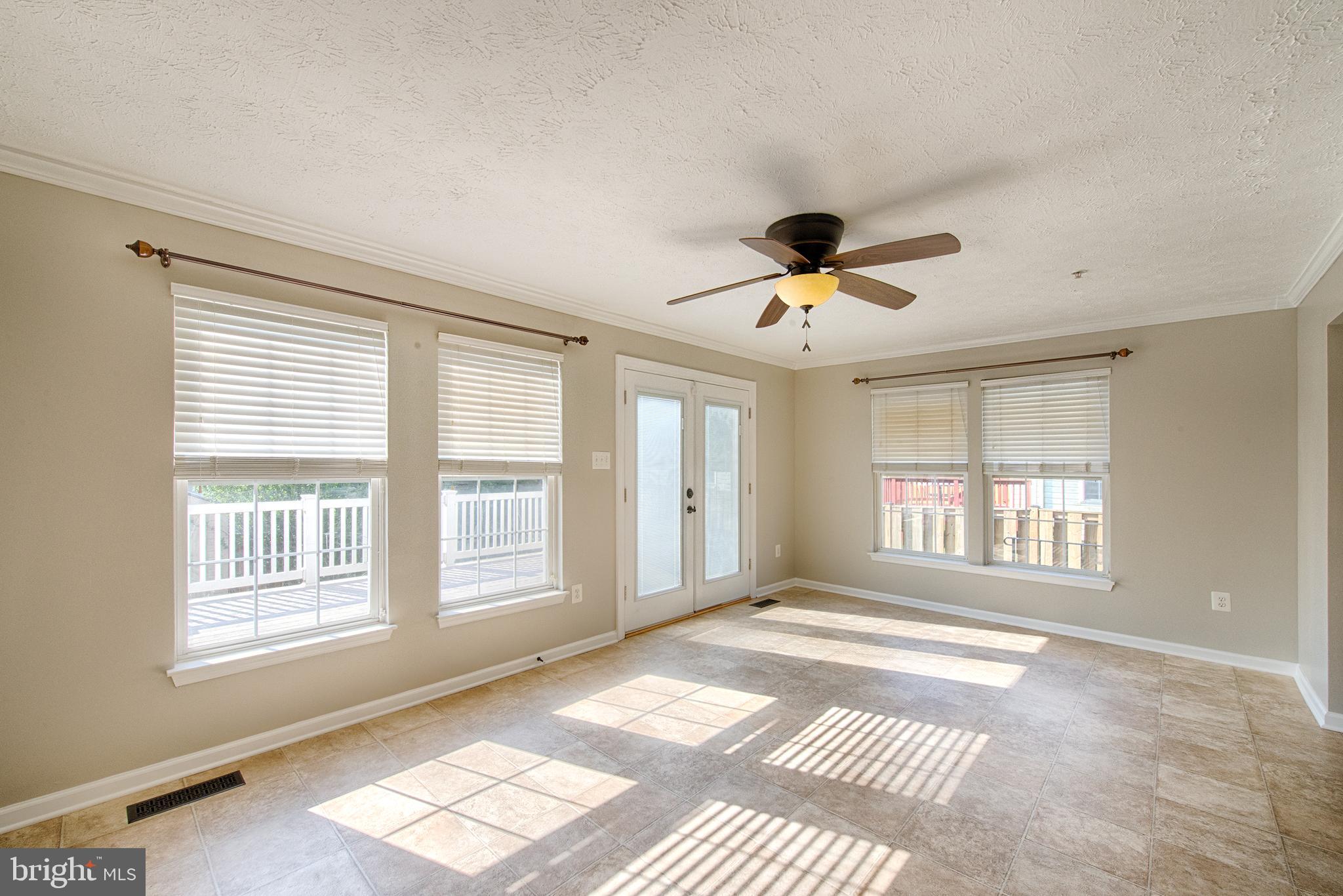 9817 Finsbury Road Baltimore, MD 21237 - Photo 12 of 36 Bright w nat light & freshly painted w ceiling fan