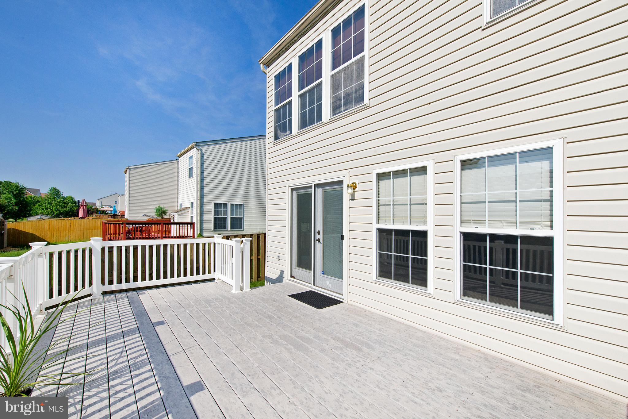 9817 Finsbury Road Baltimore, MD 21237 - Photo 15 of 36 So much space for gathering on stunning deck!