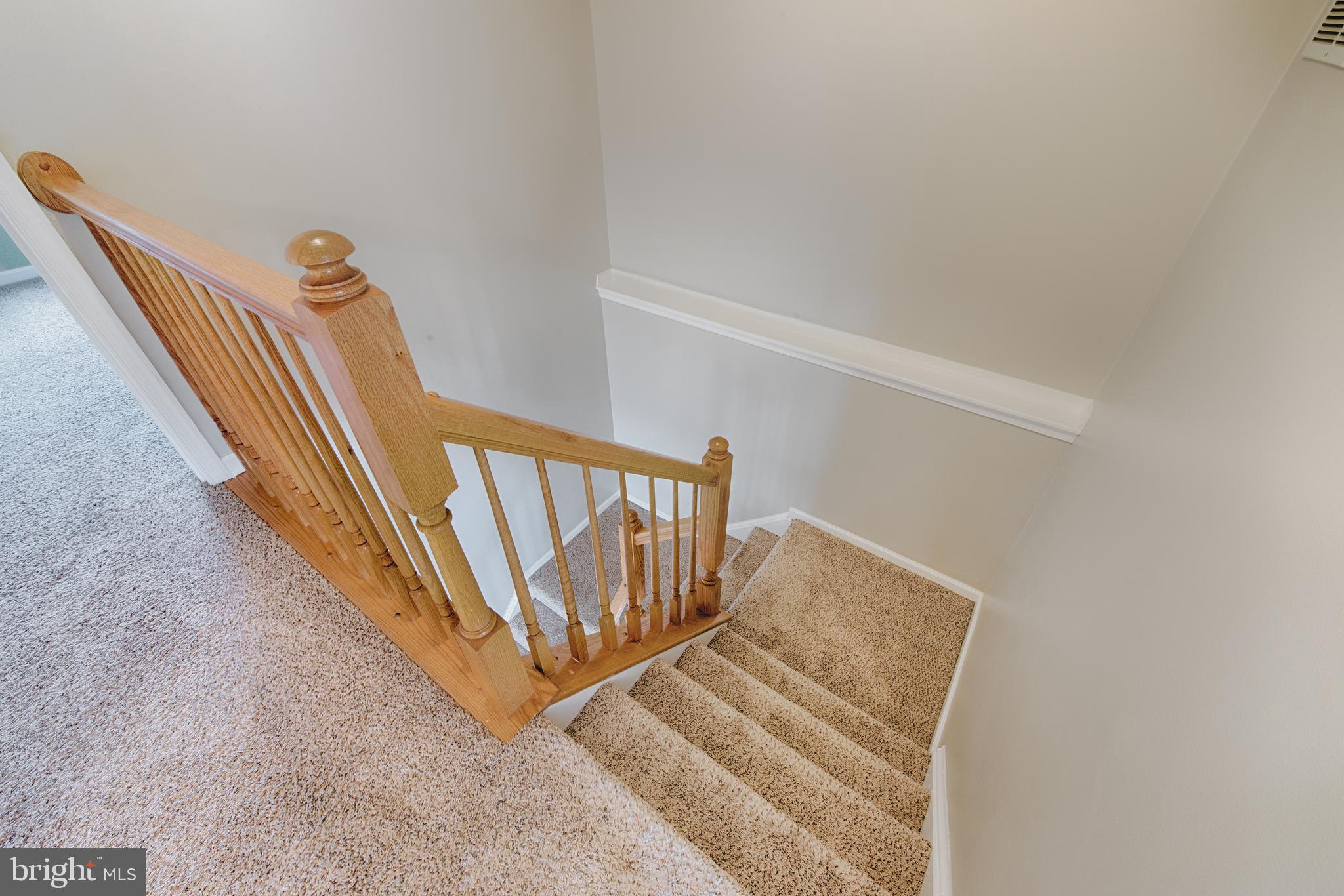 9817 Finsbury Road Baltimore, MD 21237 - Photo 16 of 36 Freshly painted hallway w decorate ledge