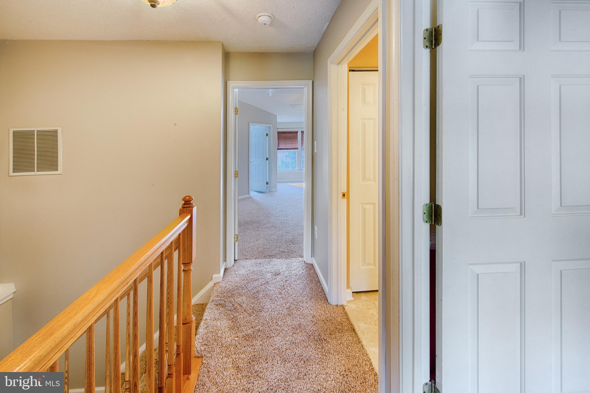 9817 Finsbury Road Baltimore, MD 21237 - Photo 17 of 36 Freshly painted hallway!