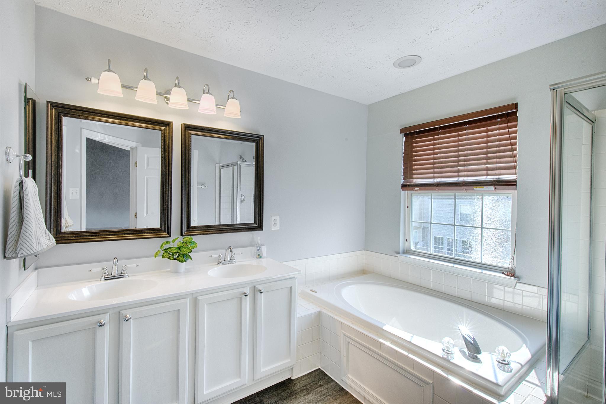 9817 Finsbury Road Baltimore, MD 21237 - Photo 21 of 36 Gorgeous master bath w dual vanity & soaking tub