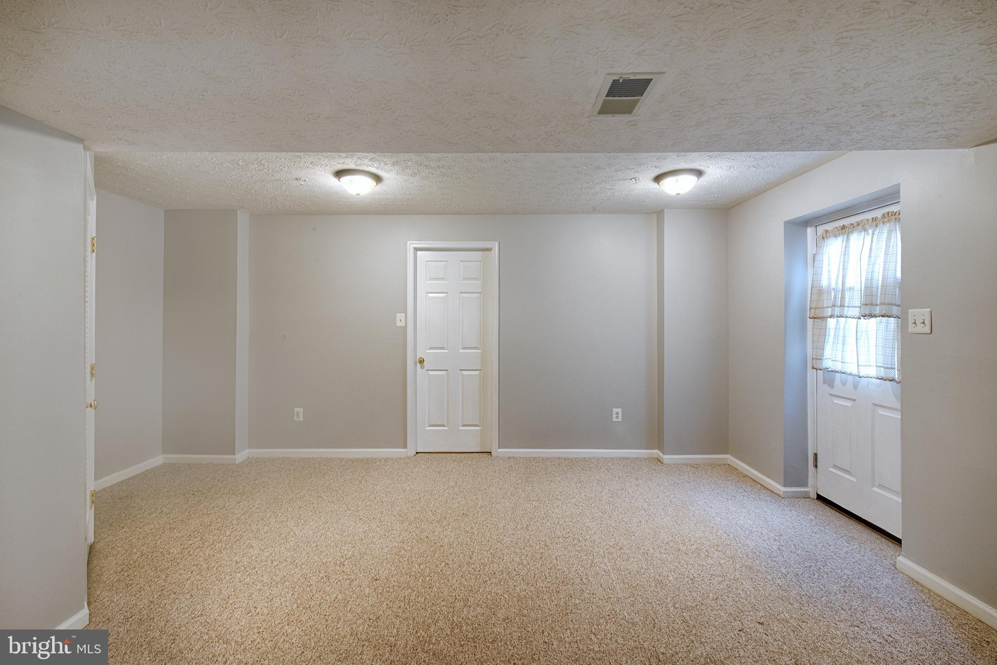 9817 Finsbury Road Baltimore, MD 21237 - Photo 30 of 36 Side exit walk up from basement