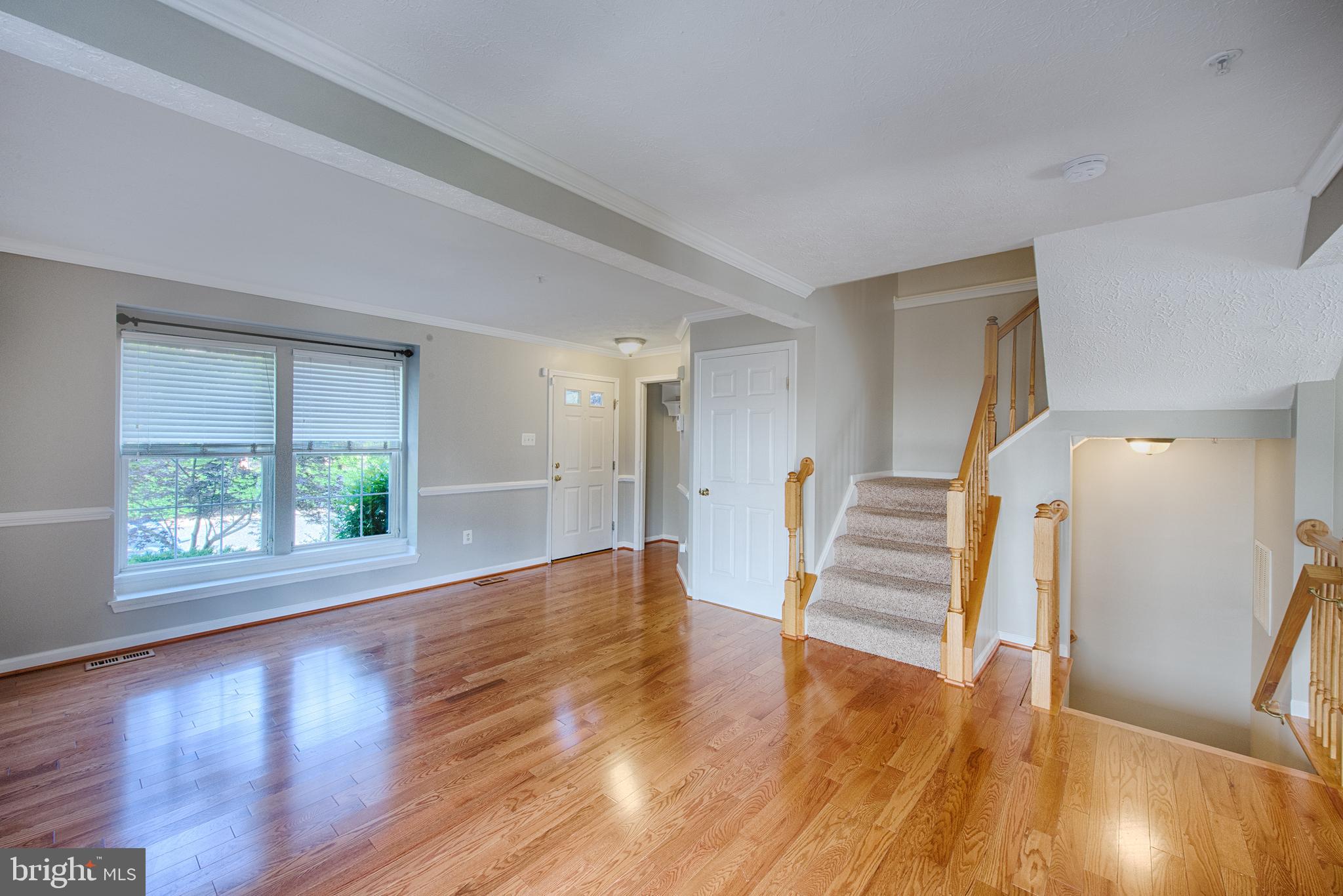 9817 Finsbury Road Baltimore, MD 21237 - Photo 4 of 36 Gleaming wood flrs drenched in nat light in LR!