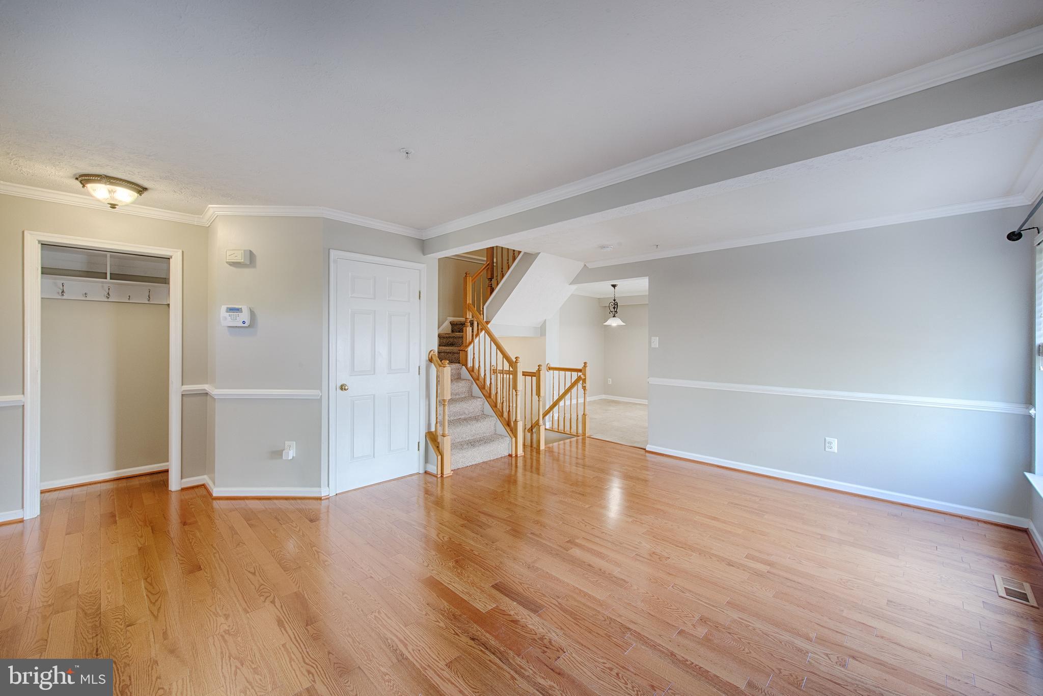 9817 Finsbury Road Baltimore, MD 21237 - Photo 5 of 36 Entry closet chair rail & crown in spacious LR/DR!