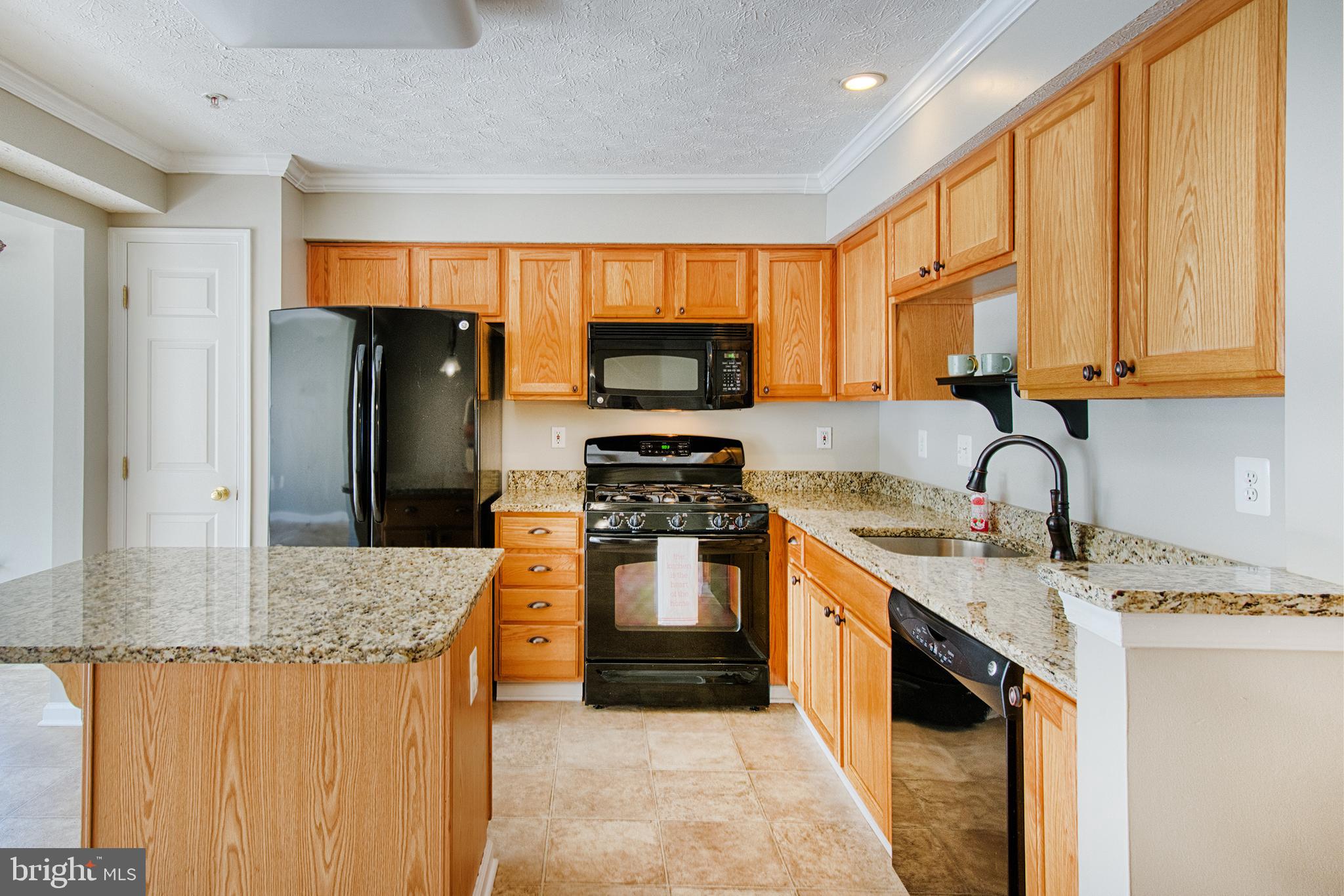 9817 Finsbury Road Baltimore, MD 21237 - Photo 8 of 36 Gorgeous crown molding, large sink & pantry