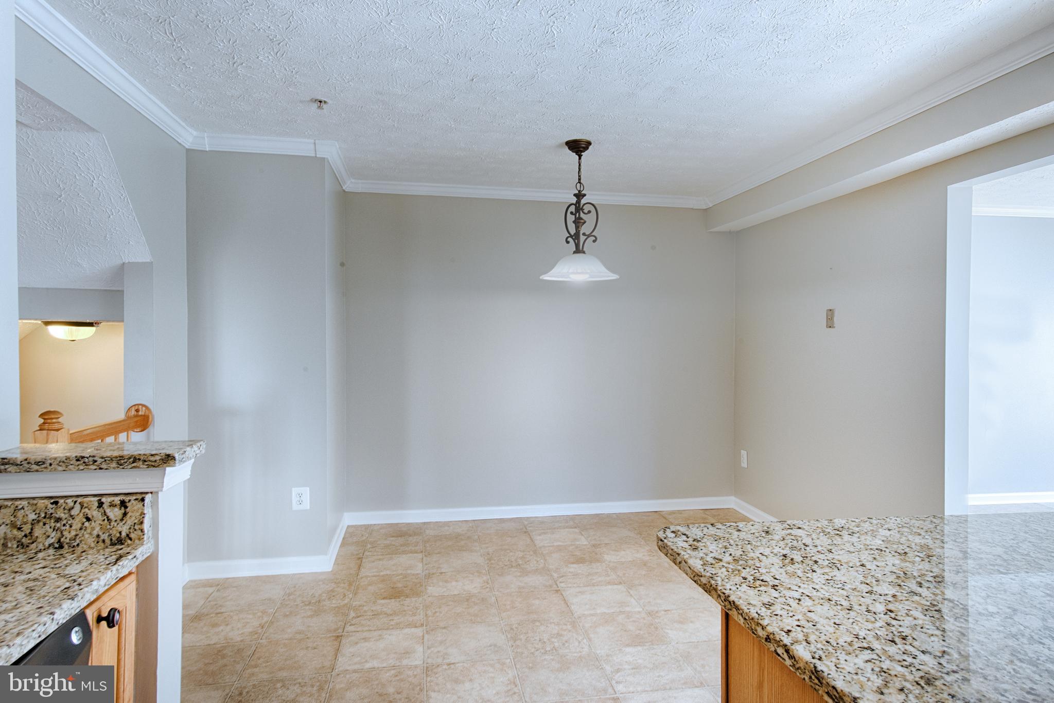 9817 Finsbury Road Baltimore, MD 21237 - Photo 10 of 36 Spacious eat in space w crown mlding & fresh paint