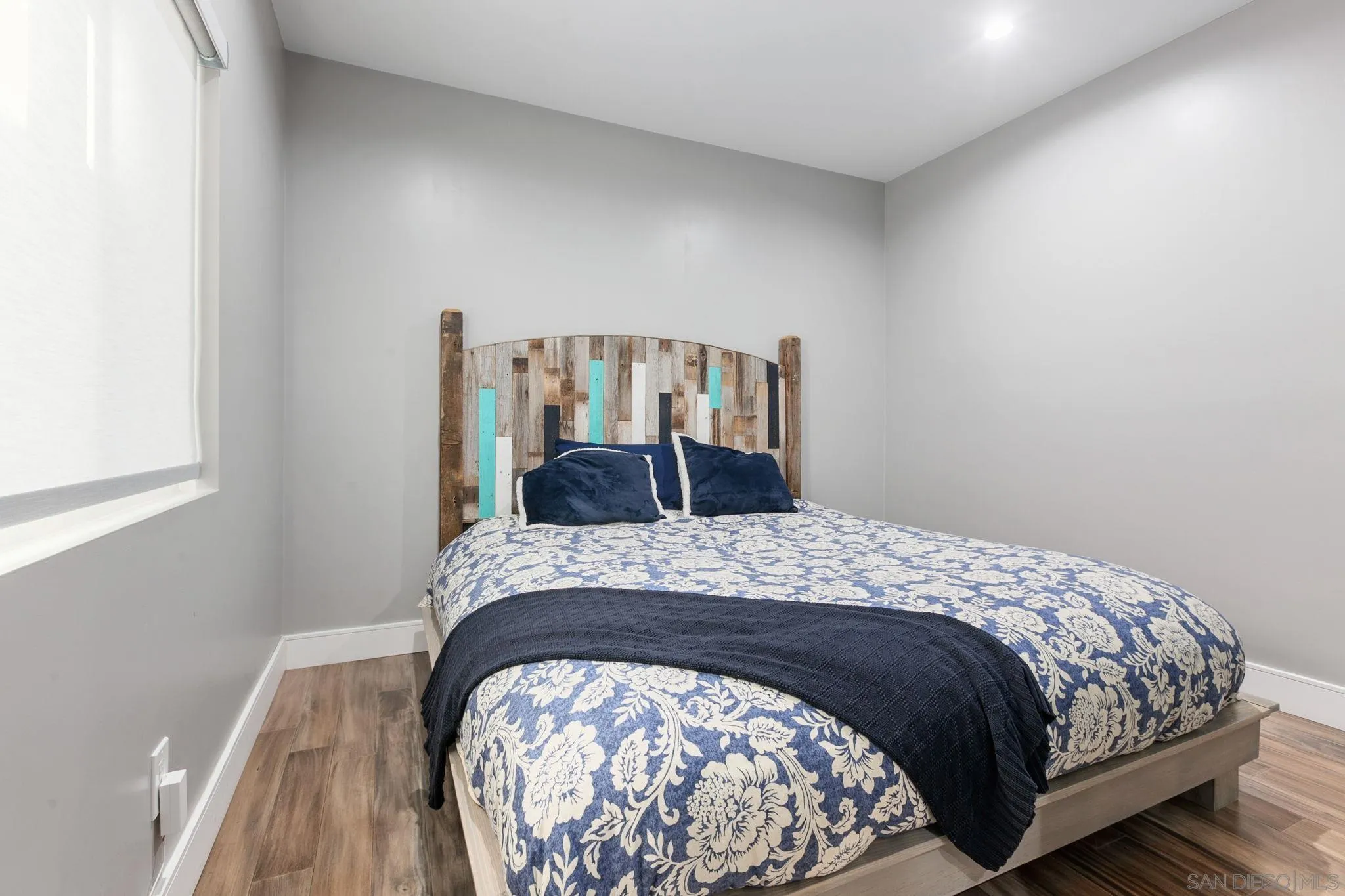 2319 Cambridge Avenue Cardiff, CA 92007 - Photo 16 of 48 a bedroom with a bed and a window