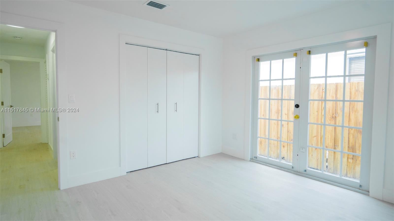320 Southwest 66th Avenue Miami, FL 33144 - Photo 14 of 24 a view of an empty room with a window