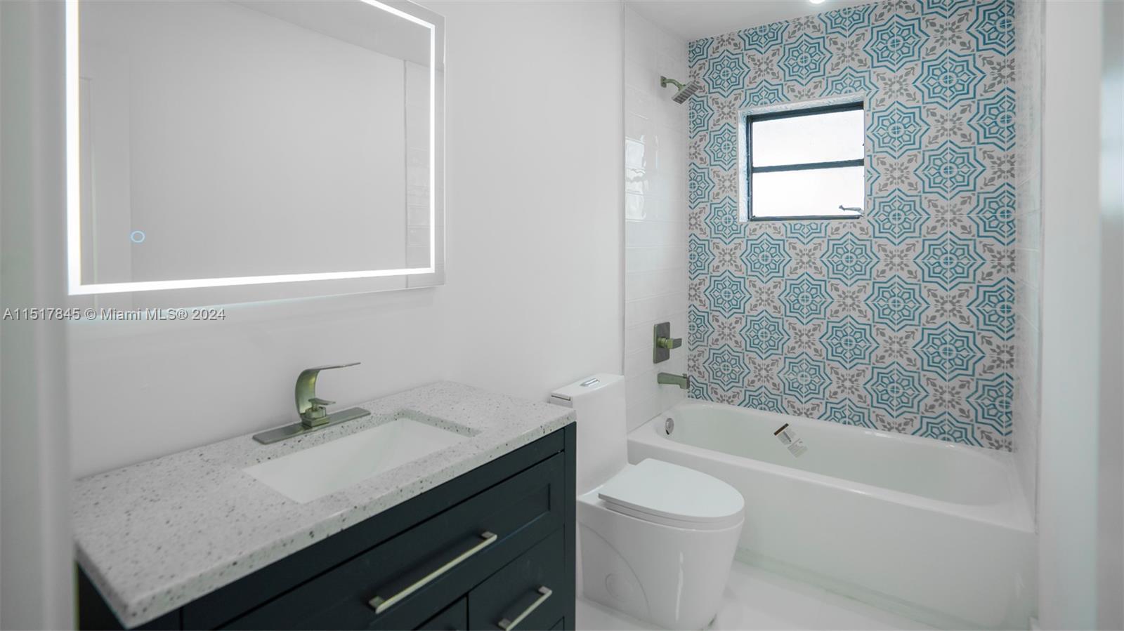 320 Southwest 66th Avenue Miami, FL 33144 - Photo 15 of 24 a bathroom with a sink a toilet and shower