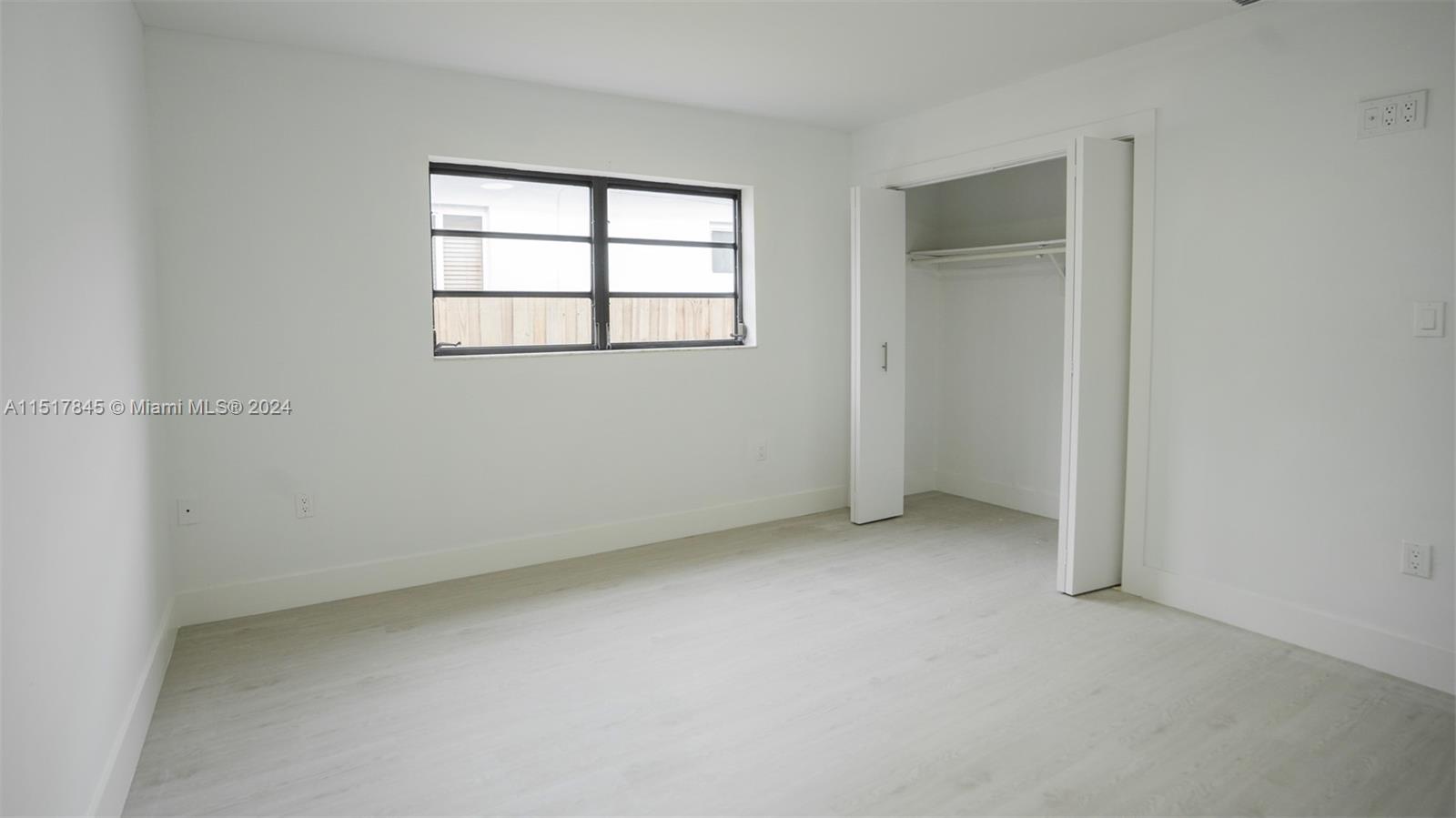 320 Southwest 66th Avenue Miami, FL 33144 - Photo 19 of 24 an empty room with windows