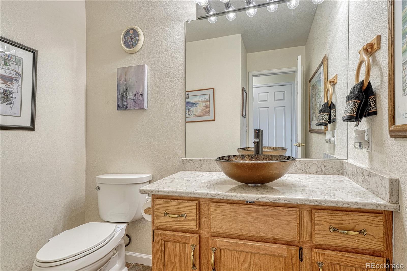 43793 Buckskin Road Parker, CO 80138 - Photo 19 of 50 a view of a living room and wooden floor
