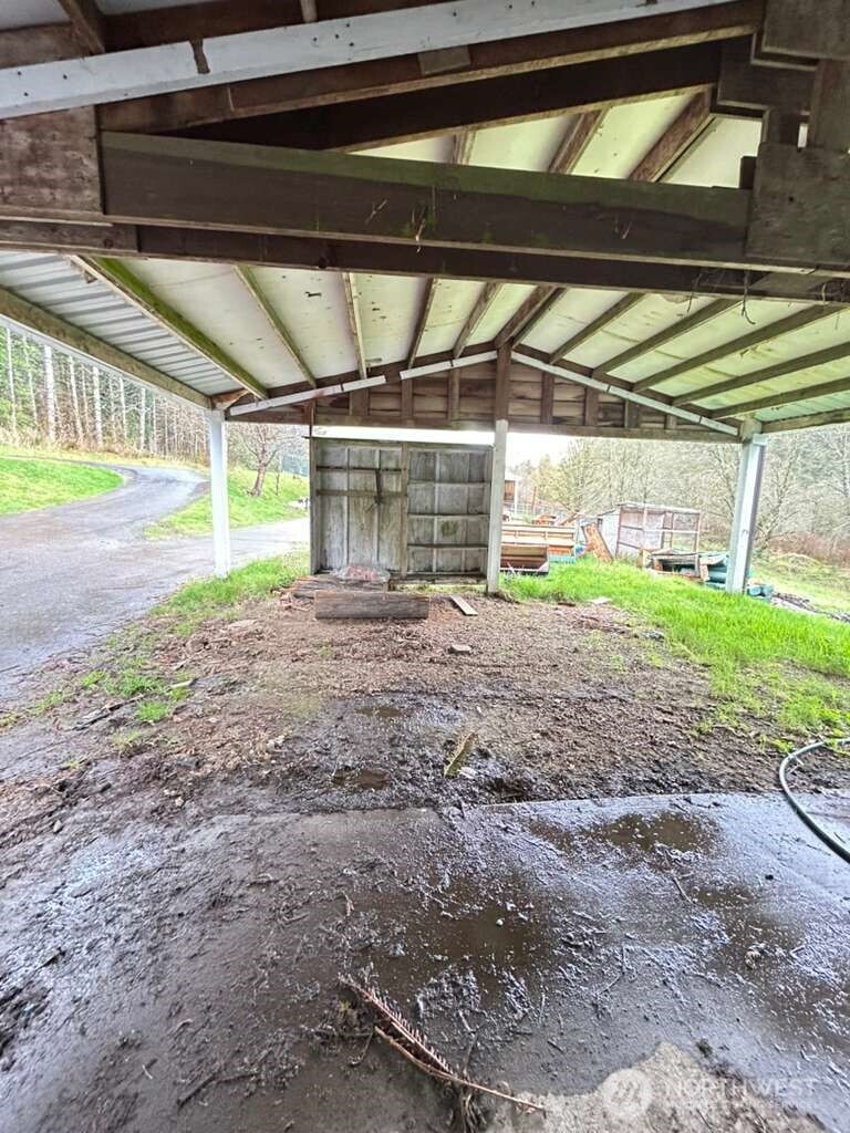 431 Highland Valley Road Morton, WA 98356 - Photo 14 of 34 a view of an empty room with a yard