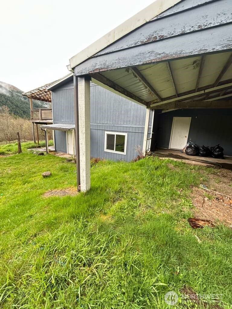 431 Highland Valley Road Morton, WA 98356 - Photo 15 of 34 a house view with a backyard space
