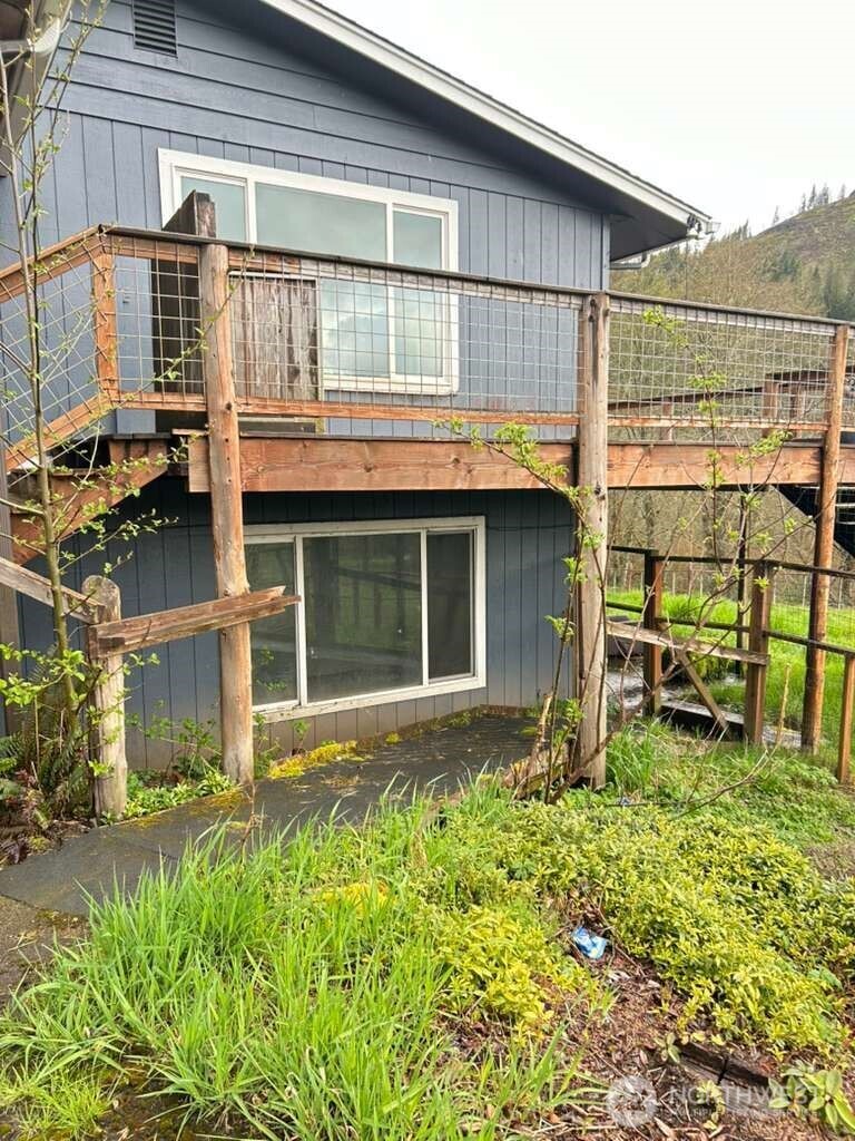 431 Highland Valley Road Morton, WA 98356 - Photo 5 of 34 a view of a house with a window and wooden fence