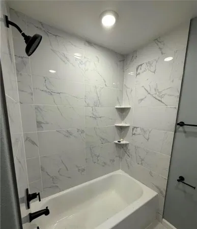 a bathroom with a bathtub