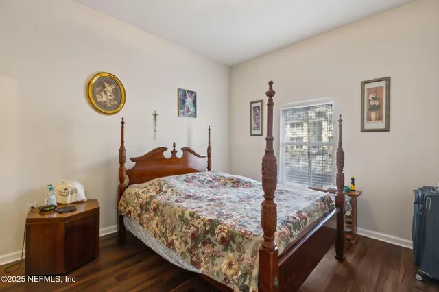 a bed room with a bed and a table