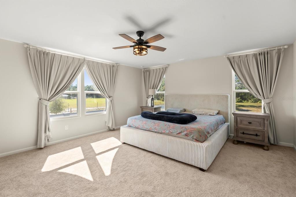 3657 Sublett Loop Tavares, FL 32778 - Photo 12 of 39 a living room with furniture and a window